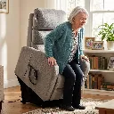 Elderly_person_rising_from_chair_202608191654.webp